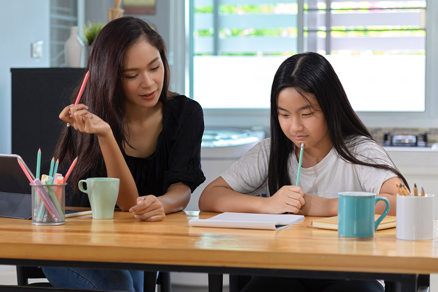 student and tutor together at a desk in San Bernardino